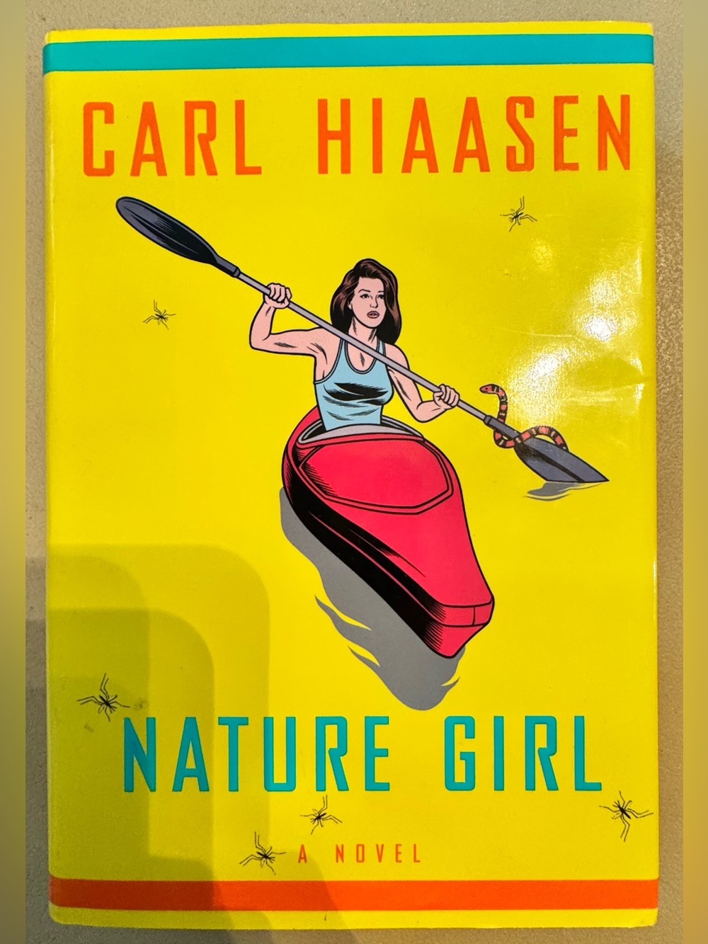 Nature Girl by Carl Hiaasen - Bright Yellow Cover